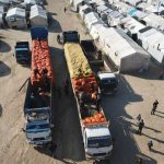File photo: Humanitarian aid provided by Palestinian Arabs is distributed at northwestern Syria’s Deir Ballut and Muhammadiyah camps near the Turkish border on Feb. 13, 2022. (Photo: Rami Alsayed/NurPhoto via Reuters)