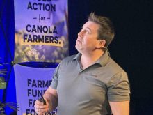 Tyler Wist from AAFC Saskatoon speaking at Manitoba AgDays 2025 about pests that affect canola.  PHOTO: Don Norman

