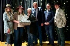 Bonnie Thompson receiving the Canadian Western Agribition 2024 Barn Boss of the Year Award