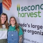 Emily Owen (left) and Katherine Hepp (right) at Second Harvest’s booth at Agriculture in Motion on July 16, 2025. Photo: Geralyn Wichers