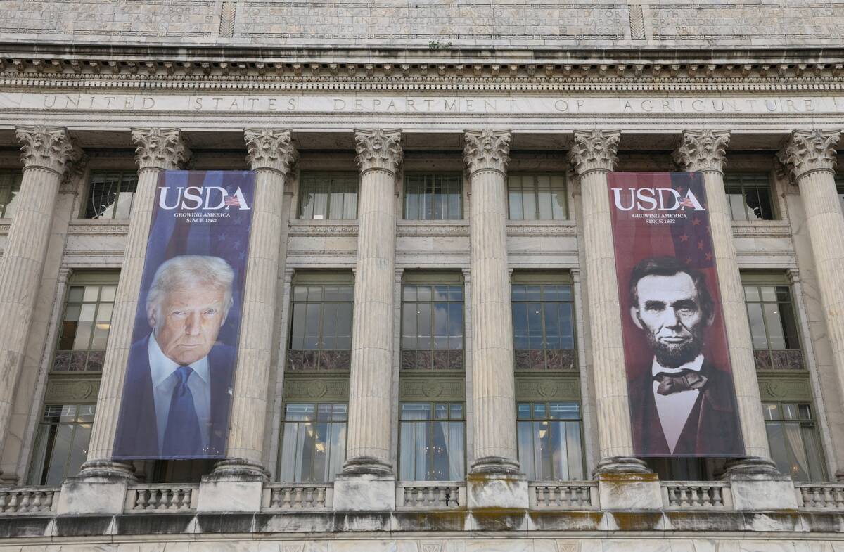 Banners of U.S. President Donald Trump and President Abraham Lincoln reading “Growing America Since 1862” hang over the entrance to the United States Department of Agriculture (USDA) in Washington, D.C., U.S., May 15, 2025. Photo: REUTERS/Kevin Lamarque/File Photo