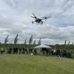 A drone takes to the skies at a farm tour on June 5.
