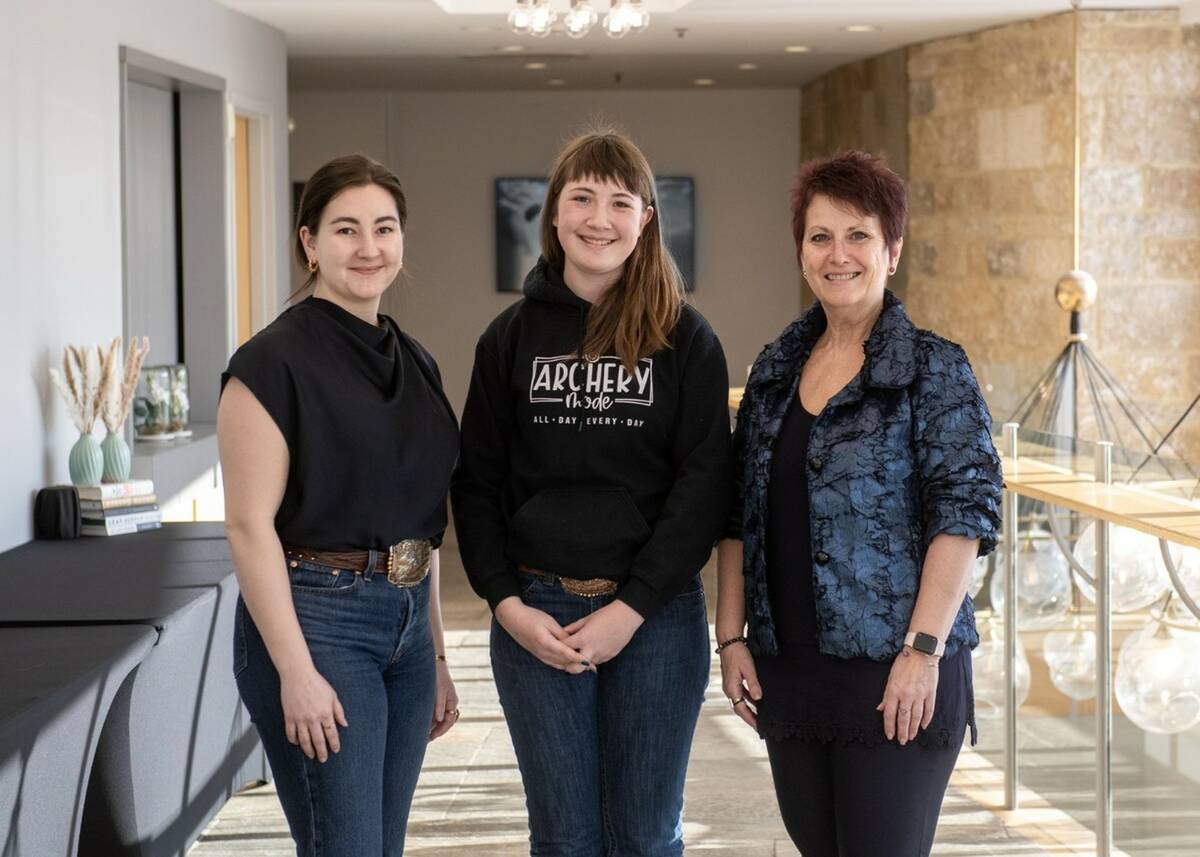 L to R: Macy Liebreich, Canadian Angus Foundation board member; Dallis Sailer, heifer voucher recipient; Belinda Wagner, Canadian Junior Angus co-ordinator. Photo: Supplied