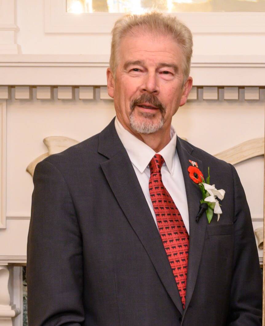 Dennis Laycraft, retiring executive vice-president of the Canadian Cattle Association, photographed in formal attire. Photo: supplied